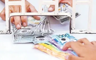 Peso sinks to record low 61.888 vs dollar